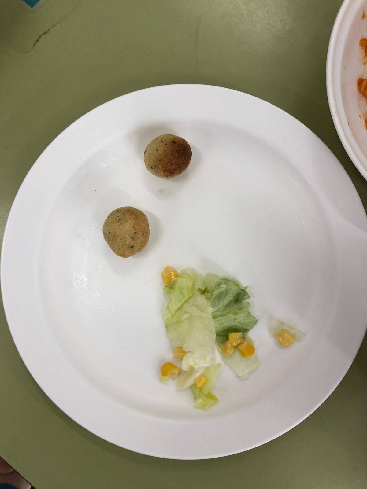 La ració de bunyols de bacallà per a un nen d'infantil - 