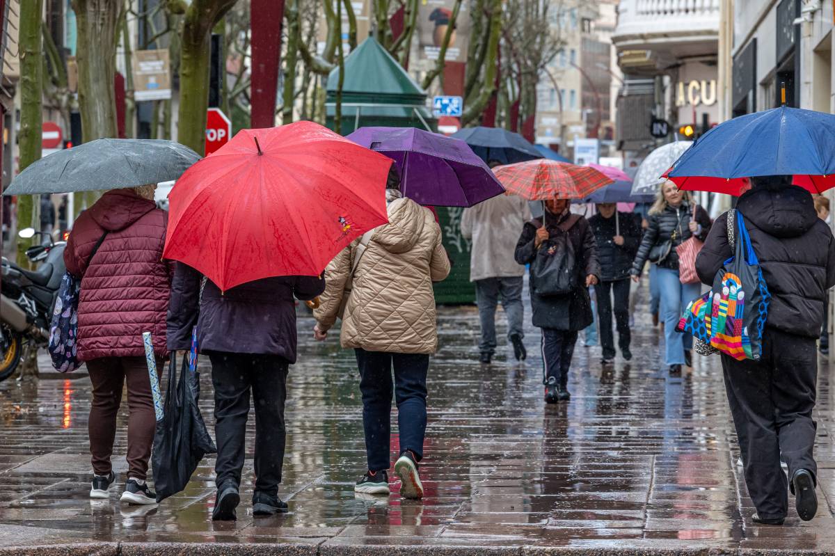 FOTOS | La pluja, protagonista d'aquest dijous
