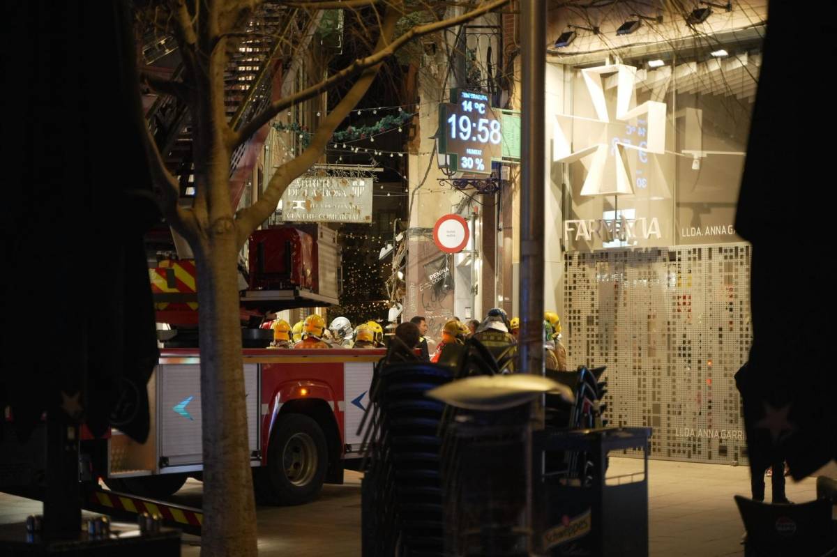 Despreniment d'una façana al Centre - DAVID CHAO