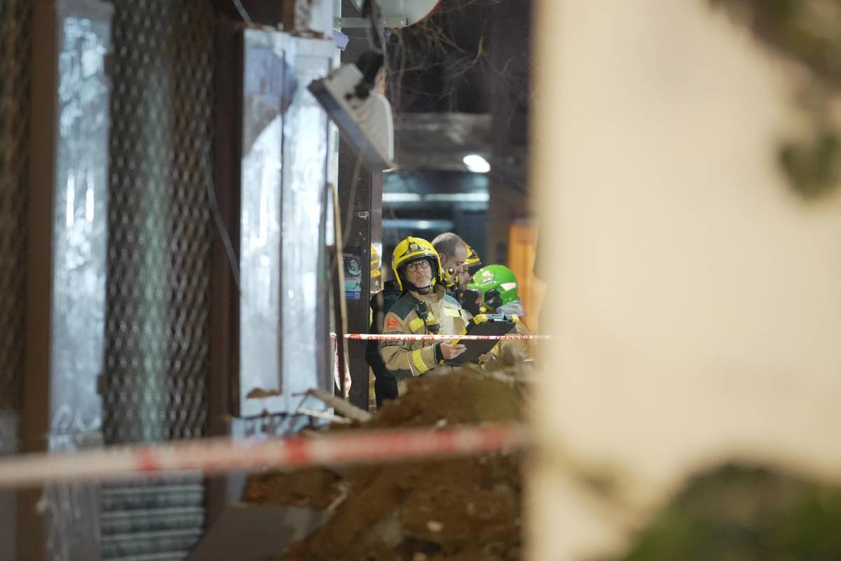 Despreniment d'una façana al Centre - DAVID CHAO