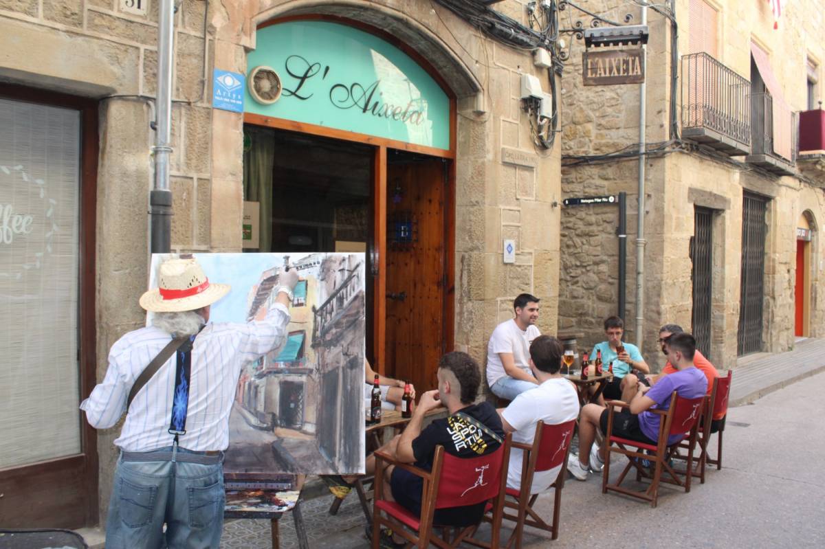 Un moment de la realització de la pintura guanyadora - Ramon Estany Un moment de la realització de la pintura guanyadora