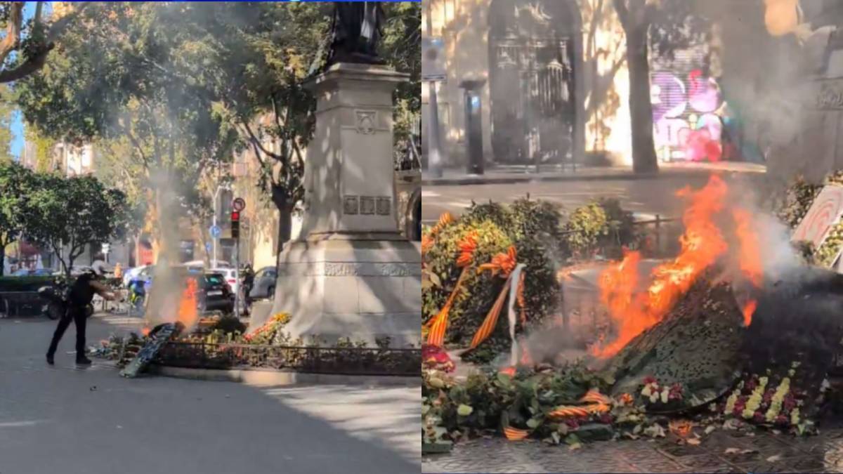 Cremen les ofrenes florals de la Diada al monument de Rafael Casanova