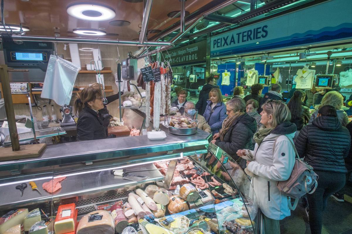 Venda de carn de porc al Mercat de la Independència - Nebridi Aróztegui Venda de carn de porc al Mercat de la Independència